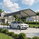 White car parked under a metal carport with a house and garden in the background
