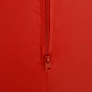 Close-up of a red zipper on a red background