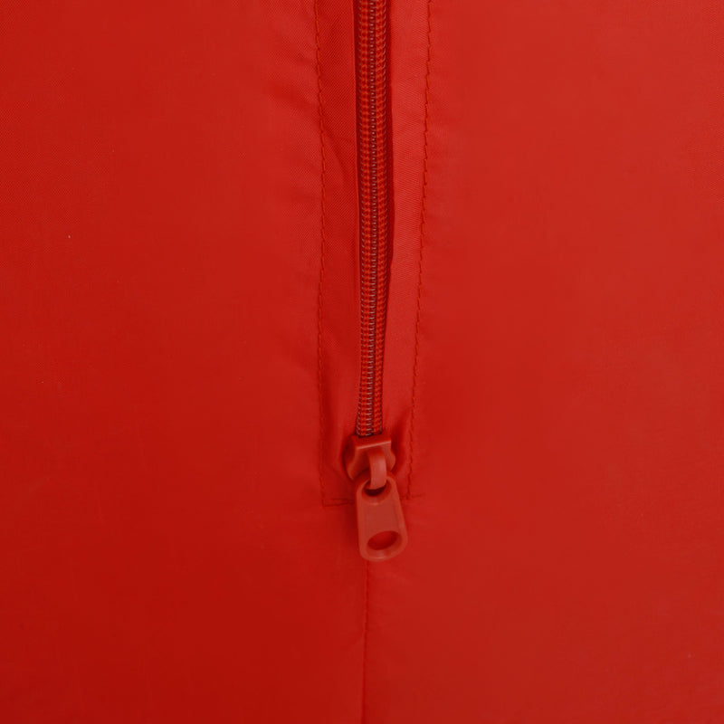 Close-up of a red zipper on a red background