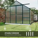 12 x 8 Greenhouse with stable design feature highlighted on a grassy area with trees and a brick wall in the background.