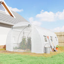 10 x 13 Green greenhouse with gardening tools and plants in a backyard setting