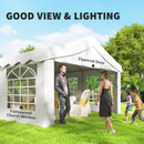 Portable outdoor shelter with transparent window and zipped door, people interacting outside.