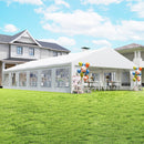 White Canopy Tent For Weddings, Party Tent with removeable walls with colorful balloons on a grassy lawn in front of a house.