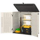 Outdoor storage shed with open doors showing various items inside.