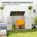Outdoor storage shed with dimensions labeled, surrounded by plants and a couch.