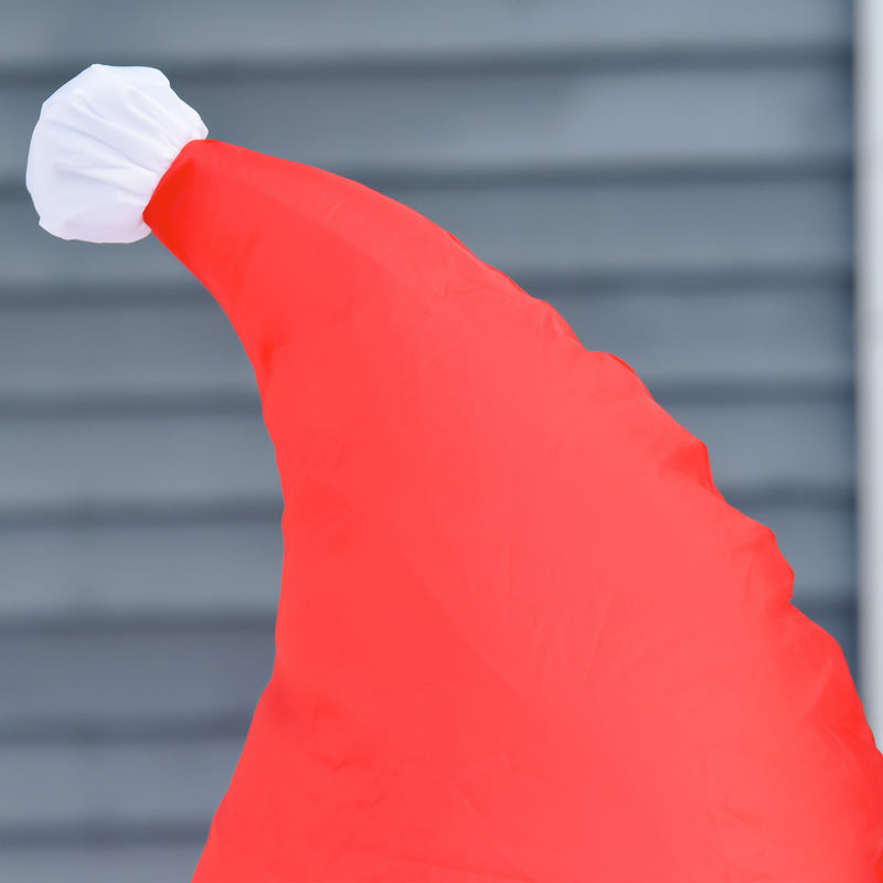 Red Santa hat against a gray background