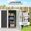 Small outdoor storage shed with open latch door, tools inside, and lock mechanism highlighted.