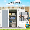 Storage shed with latch door labeled, showing dimensions and tools inside.