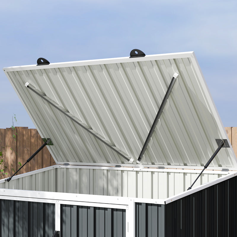 Metal roof of garbage and recycling storage bin on a clear day