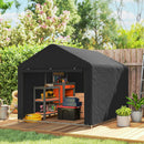 Black outdoor portable storage shed for bicycles and motorcycles with tools and supplies on a wooden deck, surrounded by greenery.