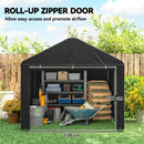 7x8 Black outdoor portable storage shed with roll-up zipper door, tools, and wood stacked inside, on grass with plants and fence in the background.