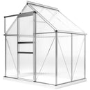 Small greenhouse with transparent panels and a metal frame on a white background
