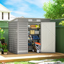 6 x 4 ft outdoor storage shed with open door showing gardening tools and equipment on a wooden deck.