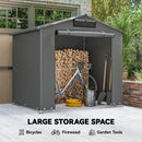 6x4 ft Outdoor portable storage shed with bicycles, firewood, and garden tools in a garden setting.