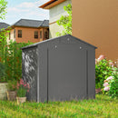6' x 4' gray portable storage shed in a garden setting with a house in the background
