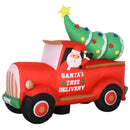 Inflatable red truck with Santa's Tree Delivery text and a Christmas tree on a white background