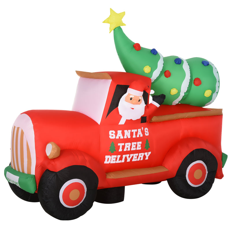 Inflatable red truck with Santa's Tree Delivery text and a Christmas tree on a white background