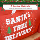 Red bag with 'Santa's Tree Delivery' text and water droplets, surrounded by Christmas decorations.