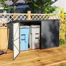 Outdoor trash bin storage shed with two bins on a wooden deck.