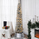 Frosted Artificial Skinny Christmas tree with lights in a living room setting.