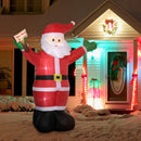 8ft Inflatable Santa Clause with LED lights displayed on snowy front yard with other light up ornaments 