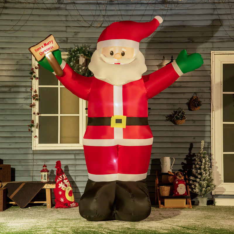 8ft Tall inflatable Santa Clause with LED lights on lawn Holding Merry Christmas Sign 