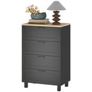 Black chest of drawers dresser with light wood top, featuring decorative items on top.