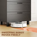 Black dresser with space at the bottom for robotic vacuum