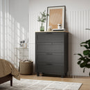 Black chest upright dresser with three drawers in a room with a bed, rug, and wall art.
