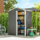 Small gray metal storage shed with open door, filled with items, in a garden setting.