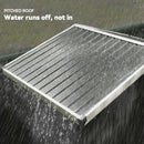 Pitched shed roof on grey shed with water running off during rain