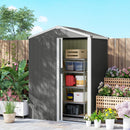 Small 4.5 x 3 ft backyard storage shed with open door in a garden setting