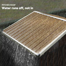 Pitched shed roof on a small outdoor storage shed with water running off during rain