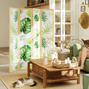 Room divider with green leaf pattern in a living room setting