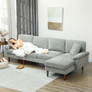 Woman sleeping on a light grey sectional sofa with chaise lounge that is reversible