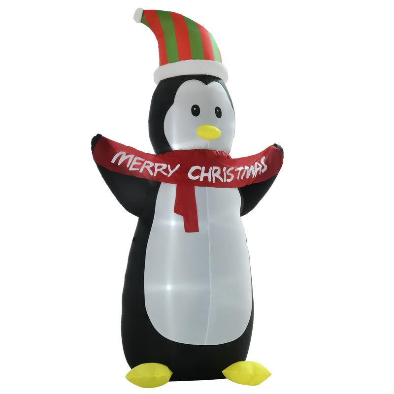 Giant Inflatable Christmas display penguin wearing a Christmas hat and scarf on a white background