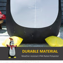 Giant Inflatable Christmas display object with water droplets on a grassy area, featuring a penguin figure and text about durable material.