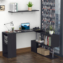 Black L-shaped desk with office items in a room with a cityscape view.