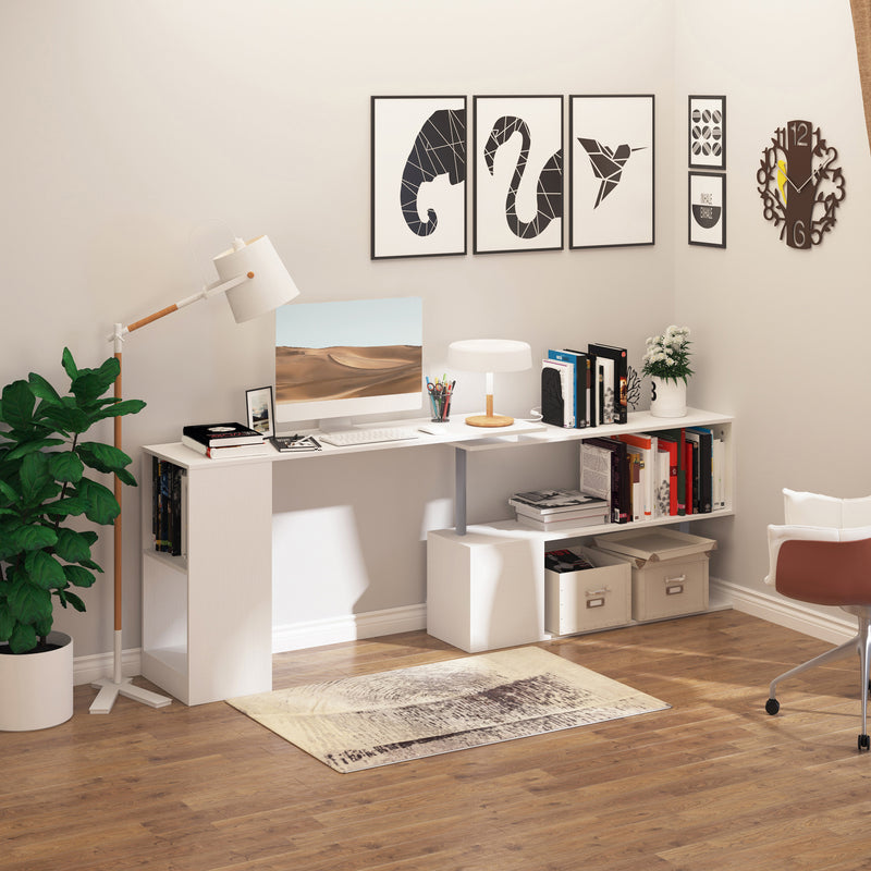 Modern home office with a white desk, computer setup, and decorative elements.