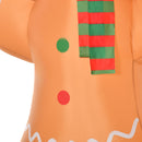Close-up of a character costume with orange body, green and red accents, and white text on a white background.