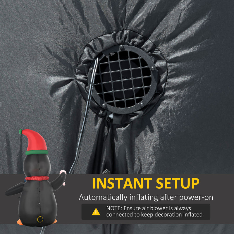 Inflatable snowman Christmas display with built-in LED decoration with air blower and text about instant setup.