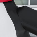 Close-up of a person wearing black pants with a blurred background