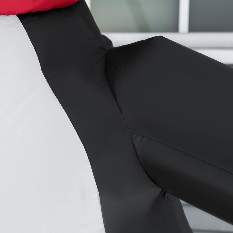 Close-up of a person wearing black pants with a blurred background