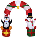 Inflatable Christmas arch with penguin and snowman decorations on a white background
