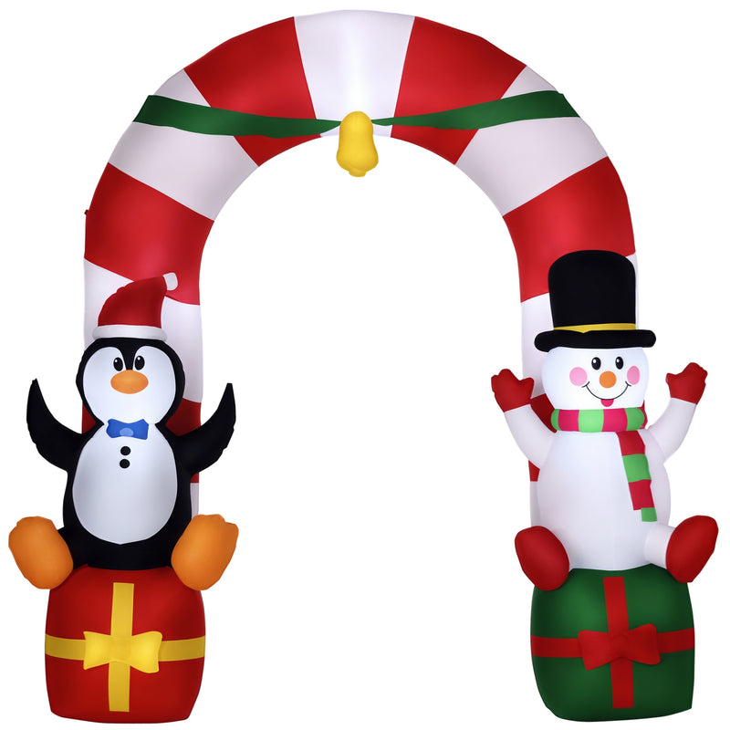 Inflatable Christmas arch with penguin and snowman decorations on a white background