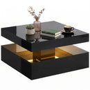 Black coffee table with decorative items on a white background