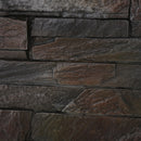 Close-up of a stone wall with brown and gray stones