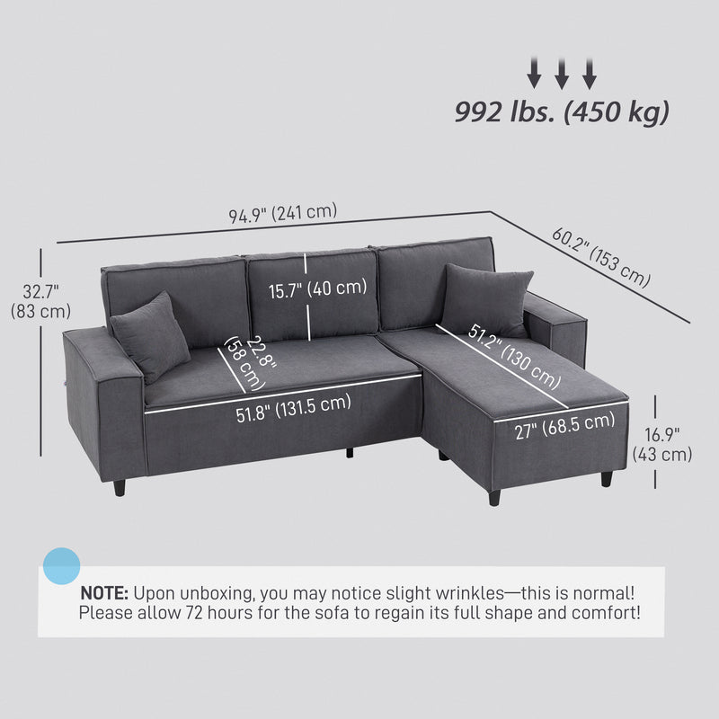Gray sectional sofa with measurements on a light gray background