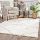 Thorin Ivory Modern Area Rug by Puffy Comforts - Seasonal Overstock
