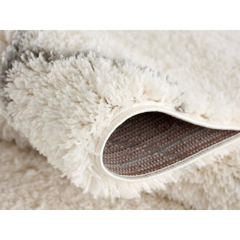 Thorin Ivory Modern Area Rug by Puffy Comforts - Seasonal Overstock